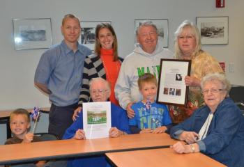 Steve Beveridge and his family: Grandson Braden, son Clinton, daughter-in-law Michelle, Steve, Cheryl, Helen Russell (mother-in-law), mother Elizabeth Beveridge Ames, and in front, grandson Hunter. (Photo by Lynda Clancy)