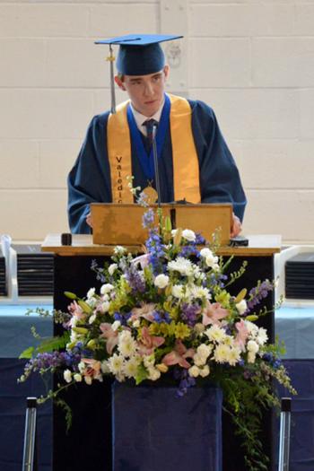 Oceanside senior Jacob Hyatt delivers his valedictory speech to the audience. (Photo by Ron Hawkes)