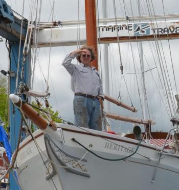 Captain Neal Parker stands on the Heritage before she is launched in May into Rockland’s harbor. (Photo by Lynda Clancy)