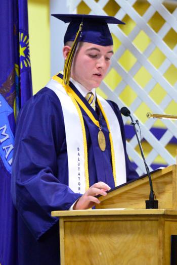 Cyril Frederick Miller delivers the salutatory address to the graduating class. (Photo by Ron Hawkes)