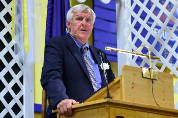 Teacher Neil Lash was the keynote speaker and he had some meaningful messages for the graduating class. (Photo by Ron Hawkes)