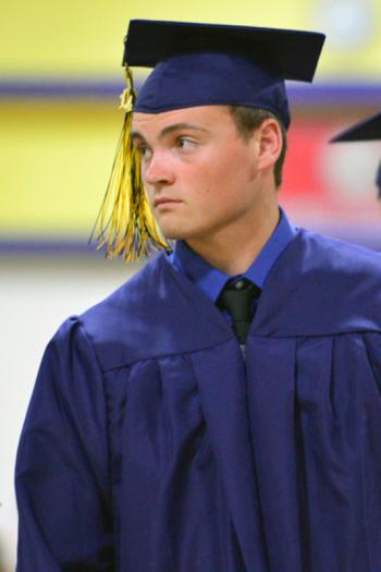 Alexander Bernard-Elder Benner gets the call for a scholarship award. (Photo by Ron Hawkes)