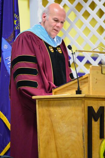 MSAD 40 Superintendent Michael R. Cormier gets the conferment of diplomas underway after a brief speech. (Photo by Ron Hawkes)