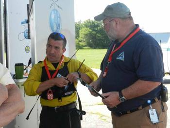 Maine Forest Service firefighter Scott Maddox and Knox Emergency Management Director Ray Sisk prepare for the exercise. (Photo by Eva Murray)