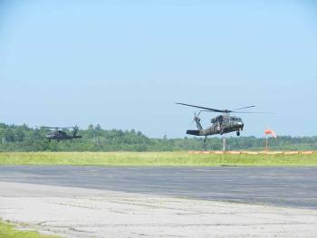 Maine Army National Guard helicopters landing at Knox County Regional Airport. (Photo by Eva Murray)