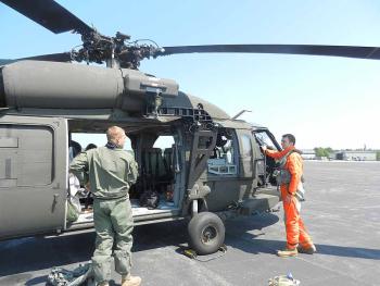 A Black Hawk crew readies for the flight. (Photo by Eva Murray)
