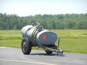 A ‘water buffalo’ tank, ready to be carried by helicopter from the mainland to Criehaven. (Photo by Eva Murray)