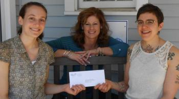 Pictured here, from left, are Joelle Albury, P.A.W.S. Director of Development, Karen Reed, Allen Insurance and Financial and Amie Hutchison, P.A.W.S. executive director.