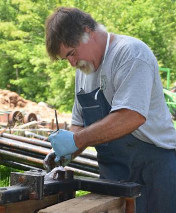 Getting the shivs in condition for the chairlift. (Photo by Lynda Clancy)