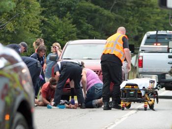 Luckily for little Mia Davis, she escaped more serious injury after she ran into the road in Camden late Tuesday afternoon and collided with a passing car. (Photo by Holly S. Edwards)