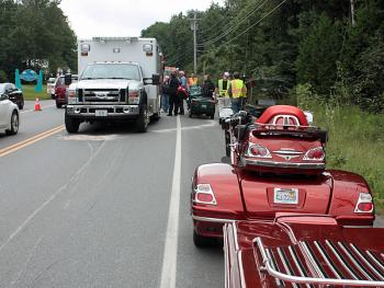 William Phillips of Palos Heights, Ill., was traveling with two other motorcycles, all from Illinois, on Route 1 in Rockport Sunday afternoon when he hit his front brake too hard and his front tire wrenched to the right, causing the bike to fall over. (Photo by Holly S. Edwards)