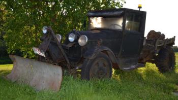 The plows get hooked to trucks in the fall, and the logs hauled in from the woods. This old truck lives in Warren. (Photo by Lynda Clancy)