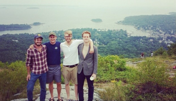 Drew DeBoard, Will McDonald, Kyle Williams and Richard Candler enjoy the view from Mt. Battie at Camden Hills State Park.