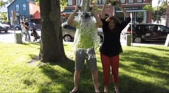 The Camden Opera House’s Kerry Hadley and Nathan Young doing the challenge on the Village Green.