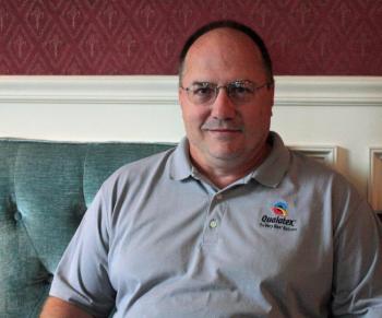 Joe Piasecki, a sales representative for Pioneer Balloon, inside the parlor of the Hartstone Inn in Camden. (Photo by Holly S. Edwards)