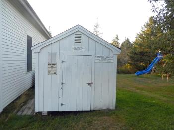 Matinicus Island Rescue's equipment storage remains unlocked through the year, and is located between the Town Office (the historic old schoolhouse) and the community playground.