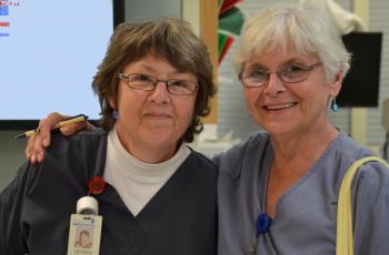Donna Kessler and Barbara Hilt. Barbara trained Donna in 2002. Barbara has retired but comes back in on a per diem basis. It’s in her blood to help people. (Photo by Lynda Clancy)