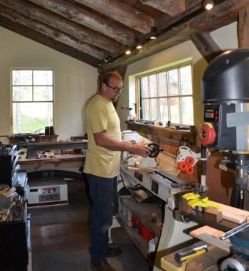 Chris Pinchbeck at work in the bagpipe studio, adjacent to Sweetland School and the Sweet Tree Arts center. (Photo by Lynda Clancy)