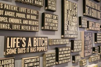 The humorous signage tends to be a huge hit with male shoppers. (Photo courtesy Motifs).