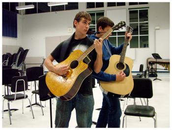 Taylor Kinney, left, and Jesse Kulbe pose for a yearbook photo in the BAHS band room. (Photo by Ethan Andrews)
