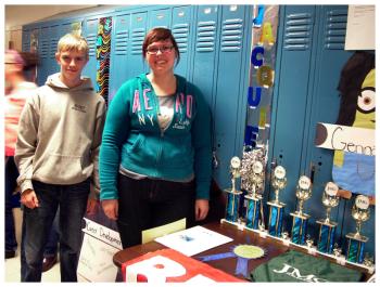 Brendan Bruns and Bianca Mitchell at the Jobs for Maine’s Graduates table. (Photo by Ethan Andrews)