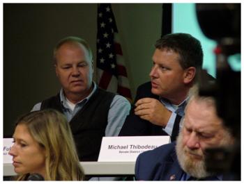 Sen Michael Thibodeau, top right, responds to a question. Seated next to Thibodeau is his challenger for the District 11 seat, Jonathan Fulford. In the foreground, Reps. Erin Herbig and Joe Brooks. (Photo by Ethan Andrews)