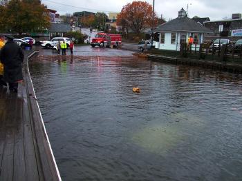 A submerged car is visible at the public boat launch in Belfast Thursday morning. The driver, Eva Lenfest of Searsport, was rescued from the car thanks to the quick action of two local workers. (Photo by Ethan Andrews)