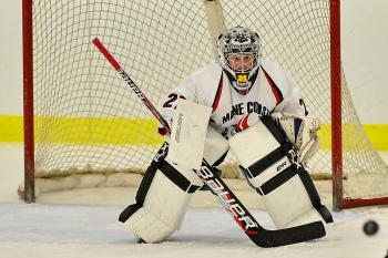 The Storm’s R.J. Botley’s eyes show the focus as he watches the puck approach the net. (Photo by Ron Hawkes)