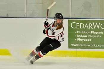 The Storm’s Eliza Roy makes a quick stop on a play. While this was a hard hitting game, one would have a hard time proving Roy was not the hardest hitter on the ice. (Photo by Ron Hawkes)