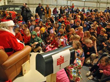 The community is invited Sunday, Dec. 7 to the Owls Head Transportation Museum's annual Holidays at the Museum event. In 2013 more than 500 people attended this free holiday event, where families enjoy activities including ornament making, cookie decorating and visiting with Santa following his arrival by airplane.