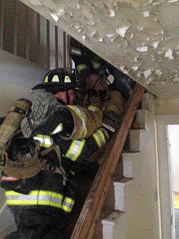 The RIT training held in Searsmont last week included practicing how to remove immobile or injured firefighters from the building. (Courtesy Jason Peasley)