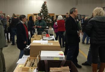 Lots of great donated items to bid on to benefit P.A.W.S. Animal Adoption Center. (Photo by Holly S. Edwards)