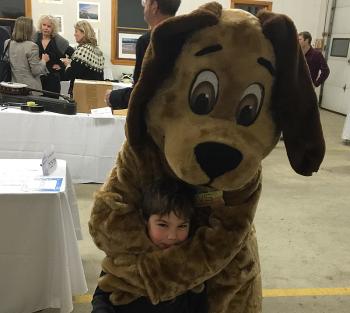 Petey and a pint-sized friend. (Photo by Holly S. Edwards)