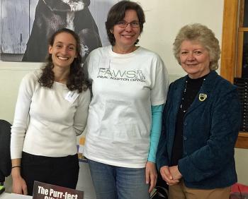 From left, P.A.W.S. Director of Development Joelle Atbury, and auction volunteers Joyce Mohr and Sharon Gilbert. (Photo by Holly S. Edwards)