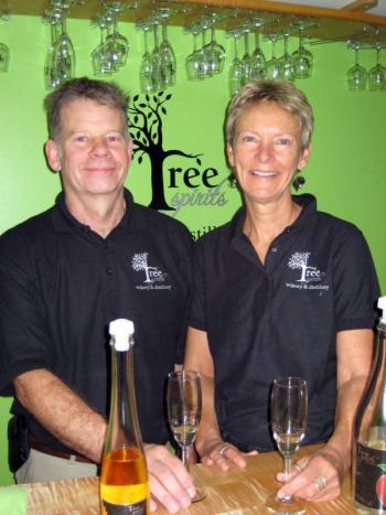 Bruce Olson and his business partner, Karen Heck.