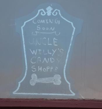 A creative sign in the window, before the real ones go up.