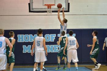 Oceanside’s Riley Sprague stole the ball at half court and drove the length of the court for an easy layup. (Photo by Ron Hawkes)