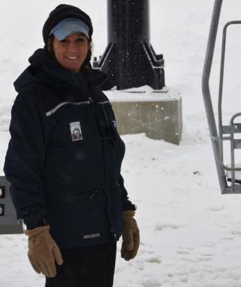 Richelle Gagne, helping skiers negotiate the new lift. (Photo by Lynda Clancy)