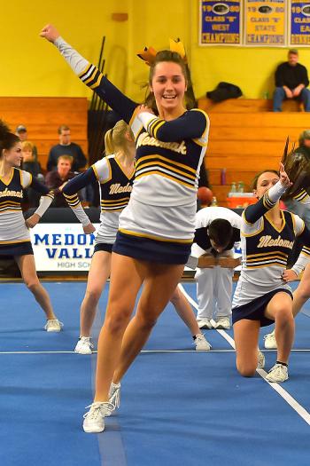 That smile on Medomak’s Ashlee Wilson is permanent while she is on the mats. (Photo by Ron Hawkes)