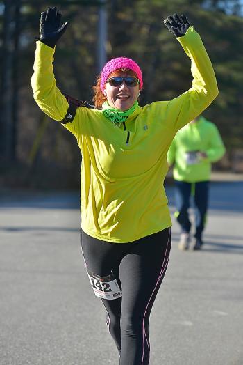 Jody Coffin Dinsmore, as usual, had a great time running. (Photo By Ron Hawkes)