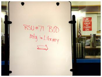 A sign in the hallway at Troy Howard Middle School in Belfast, Jan. 20. The newly-formed RSU 71 board of directors met there Tuesday night and resolved to hold future meetings there every Monday at 7 p.m. for the time being. (Photo by Ethan Andrews)