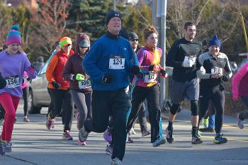 A good size group of over 50 racers participated in the Set the Pace 5K in Camden New Year’s Day morning. The race supports the Go! Malawi organization. (Photo By Ron Hawkes)