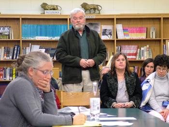 Bruce Mailloux, standing, at an organizational meeting of the RSU 71 board of directors, Jan. 20. The former Belfast area superintendent is positioned to be interim superintendent of the new district. (Photo by Ethan Andrews)