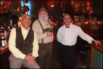 Left to right is Dave Robichaud, owner of Cappy’s; John McKean, of Camden, in traditional German Lederhosen ;and Cappy’s Executive Chef Peter Gelman. (Photos by Chris Wolf)