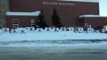 Signs with each player’s name sent off the Oceanside boys basketball team. (Courtesy Oceanside Blue Crew)