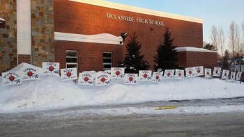 Signs with each player’s name sent off the Oceanside girls basketball team. (Courtesy Oceanside Blue Crew)