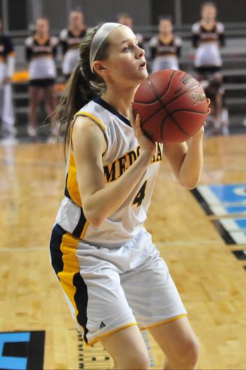 Medomak’s Maggie Cox gets set to put up a shot in first quarter of Friday’s contest. (Courtesy of Skip Hawkes/mainesportsreport.com)