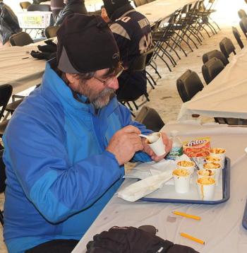 Alan Frizzell of Stratford, N.H. samples chili during West Bay Rotary Club’s Chili Challenge Saturday. #toboggannationals