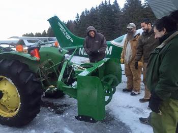 From left, David Ames, Robert Young, and Penobscot Island Air pilots Tomas Sowles and Mike Falconeri. (Photo by George Tarkleson)