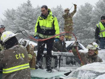 Hermon Fire Capt. Chandler Corriveau helps direct firefighters, troopers and other first responders to check on the many motorists still inside their wrecked vehicles following Wednesday morning’s 75-car pile-up on I95 in Etna and Hermon. (Courtesy Maine Dept. of Public Safety)
